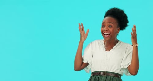 Surprised Woman Expressing Excitement on Blue Background