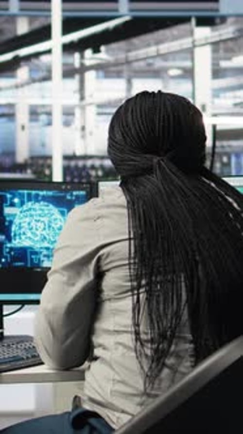 Vertical Video Data Center Staff Member in Office Using AI Deep Learning Algorithms