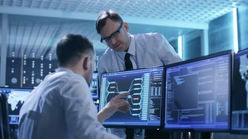 In the System Control Center Technical Support Team Gives Instructions with the Help of the Headset