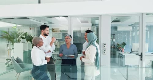 Diverse Team Collaborates in Modern Office Space