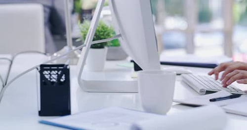 4k video footage of unrecognizable businesswoman working on their computers in a modern office