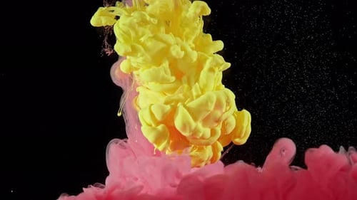 Colorful Ink Swirling in Water on Black Background