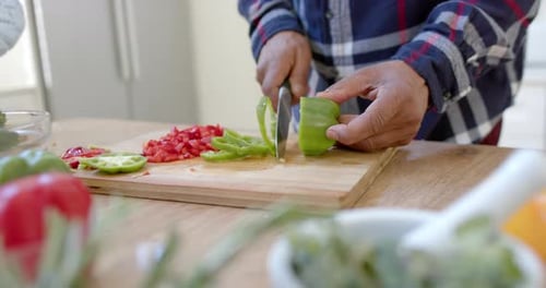 Chopping Vegetables on a Cutting Board