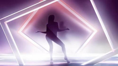 A Silhouette Woman Is Casually Dancing Against A Lighting Stage Background