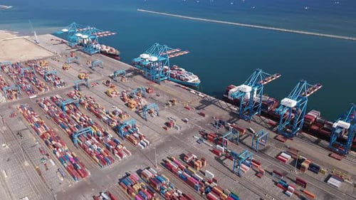 Aerial View of Busy Shipping Port and Loading Dock