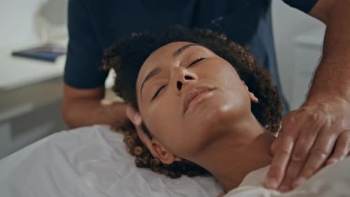 Woman Receives Relaxing Neck and Shoulder Massage