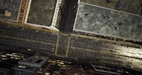 City Intersection View with Tall Buildings and Empty Streets During Night