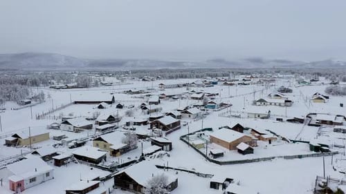 Aerial view of snow covered houses, Russia.