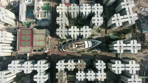 Drone View Over Hong Kong Whampoa Buildings Featuring the Cruise Ship