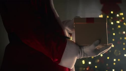 Magical Christmas Gift Box Opening Near Christmas Tree