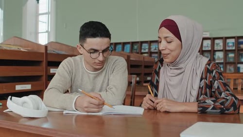 Students Studying Together in Library