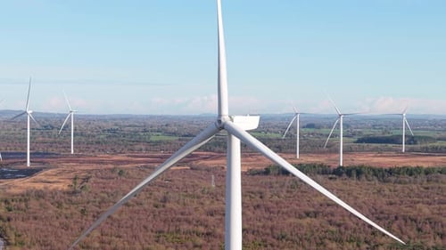 Wind Farm - Wind Turbines Producing Renewable Energy In Daytime. - aerial shot