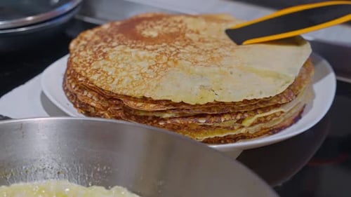 Delicious Pancake Stack Close-Up Preparation