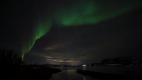 Green Northern Lights Dancing In The Night Sky. Aurora Borealis. timelapse