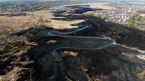 Aerial View of Burned Rural Landscape After Fire