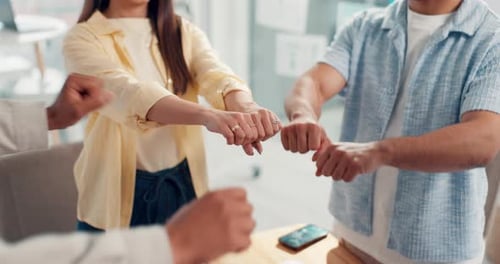 Business people, hands and fist bump together for collaboration, announcement or success in office