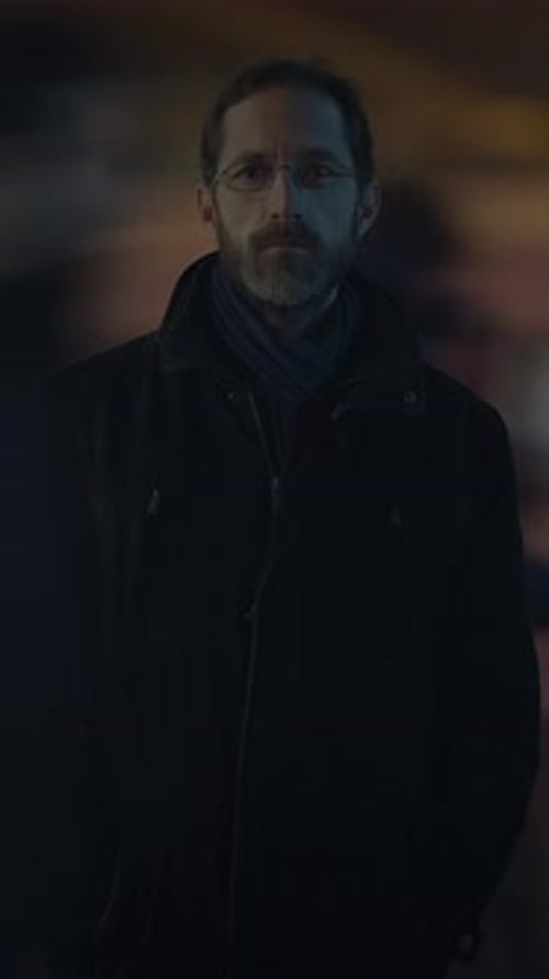 Man With a Beard Stands Still at Night