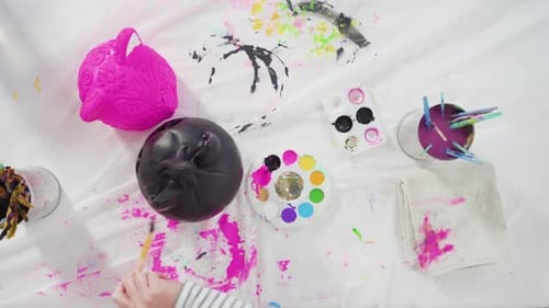 Flat Lay Painting Craft Pumpkin with Acrylic Paint for Halloween