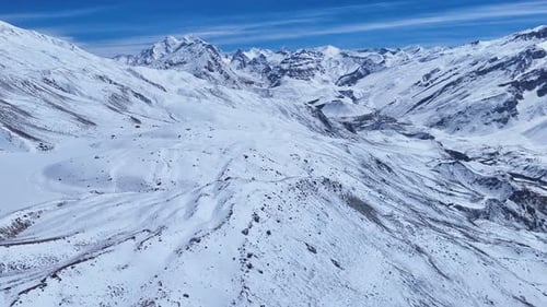 Snowy Mountain Range Aerial View in Winter