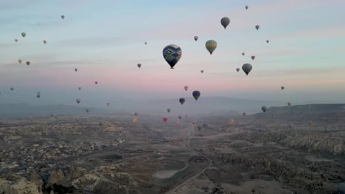 Hot air balloon flight in Goreme in Turkey during sunrise.