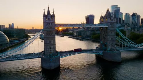 Aerial flyover famous Tower Bridge showcasing London city skyline