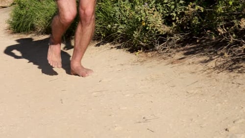 Running barefoot in the sand