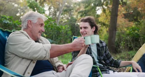 Camping, coffee or cheers with father and son outdoor in forest for adventure, bonding or travel