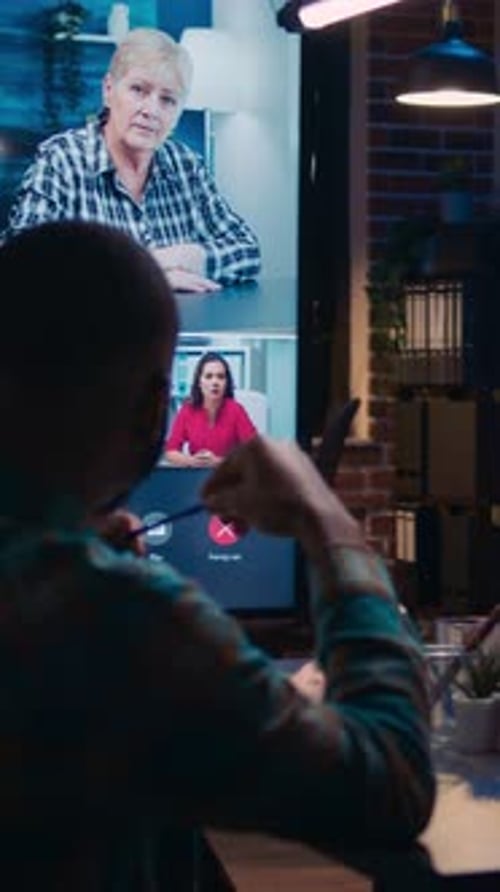 Team Meeting in Modern Office Using Vertical Display