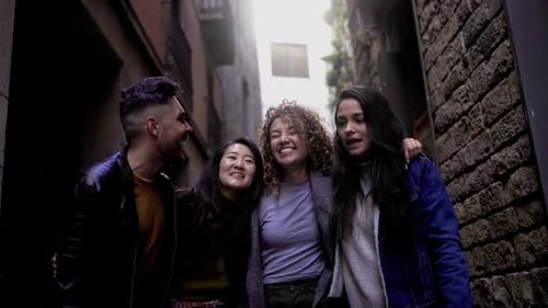 Happy diverse people having fun walking by the city - Multiracial friends lifestyle concept