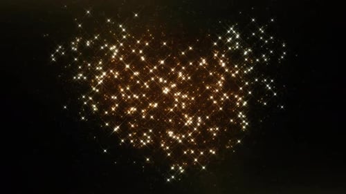 Sparkling shining glowing gold particles.