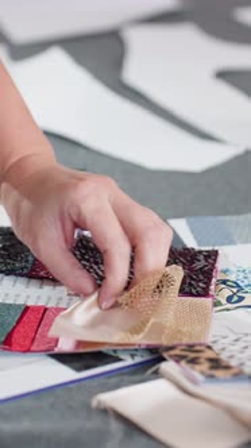 Woman Selecting Fabric Samples in Design Studio