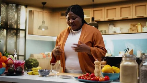 African American Food Vlogger Preparing Nutritious Chia Seeds Yogurt Bowl
