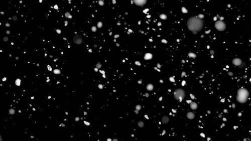 Partículas de neve em fundo preto