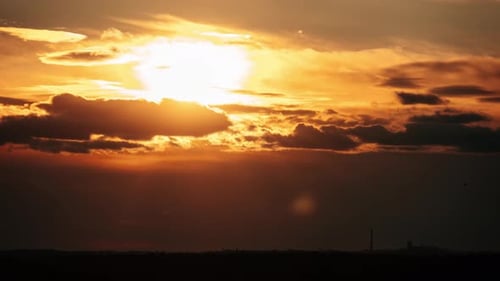 Dramatic Golden Sunset Sky with Rolling Clouds