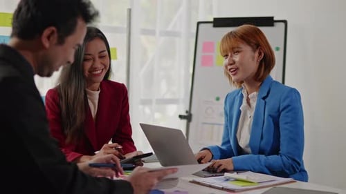 Young Adults Collaborate in Bright Corporate Office