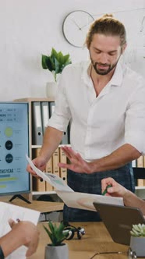 Business People Reviewing Data in an Office