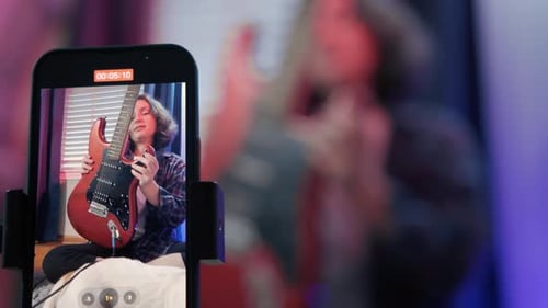 Close Up of Art Woman Bloggers Online Lesson Recording Playing Guitar