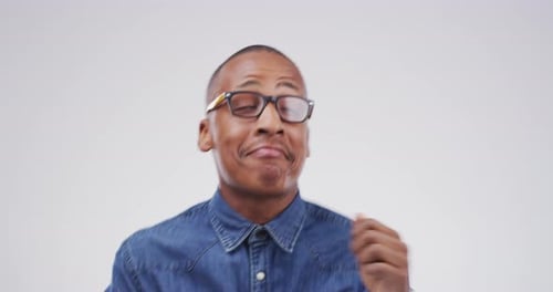 Young Man Dancing in Studio Setting