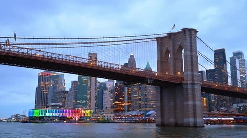 Approaching the Brooklyn Bridge by the river.