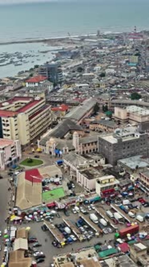 Vibrant aerial view of Accra's coastal landscape and bustling streets