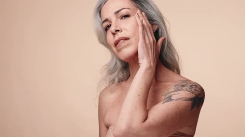 Elegant Senior Woman Posing in Studio Setting