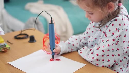 Child Creating Art with 3D Printing Pen