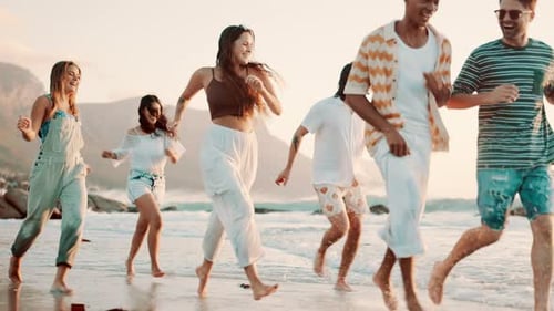 Friends, group or running on beach for travel with bonding, happiness or playing on vacation