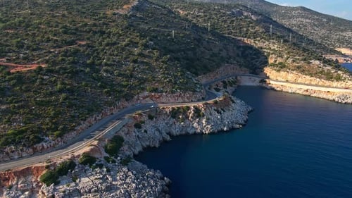 Cars Moving By Sea Curved Road on the Mediterranean Sea Coast