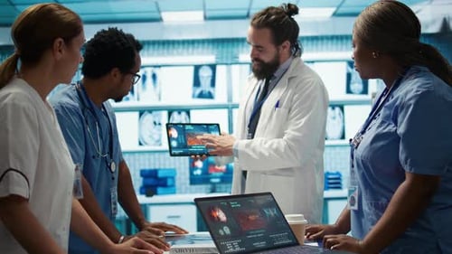 Healthcare Professionals Attending a Strategy Meeting in a Medical Center