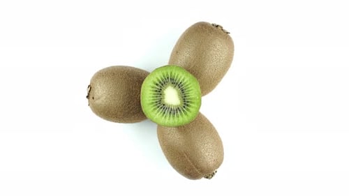 Fresh Kiwis Displayed on a Clean White Surface