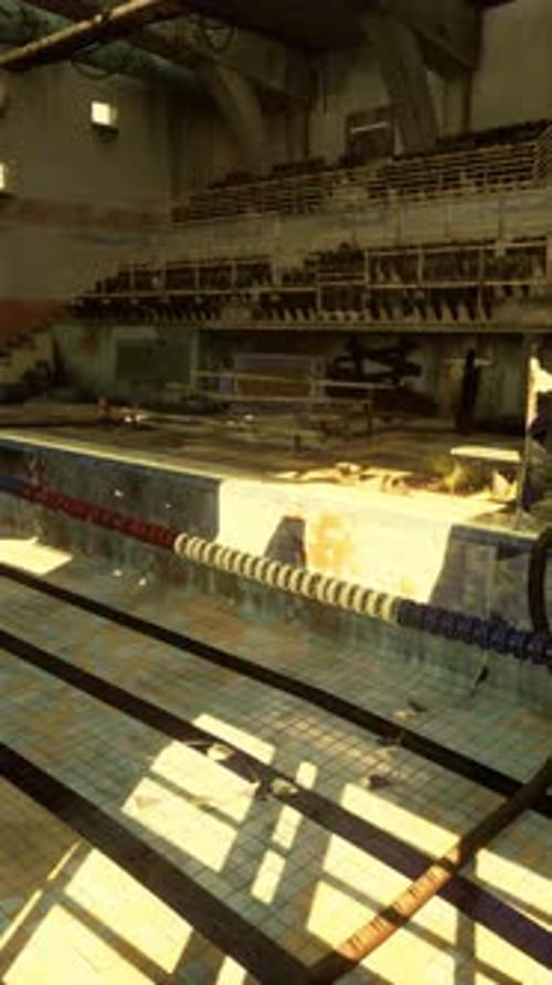 Derelict Indoor Pool in Neglected Facility