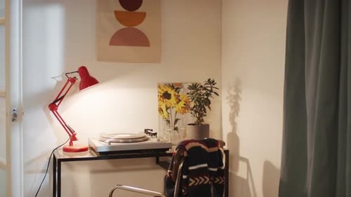 Table with Music Player on It and Retro Poster above It in Comfy Flat