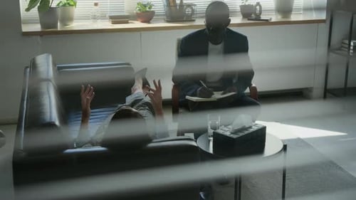 Woman Talking to Therapist During a Counseling Session