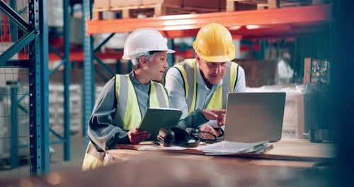 Team, engineer and planning on laptop in factory for stock, distribution or shipping